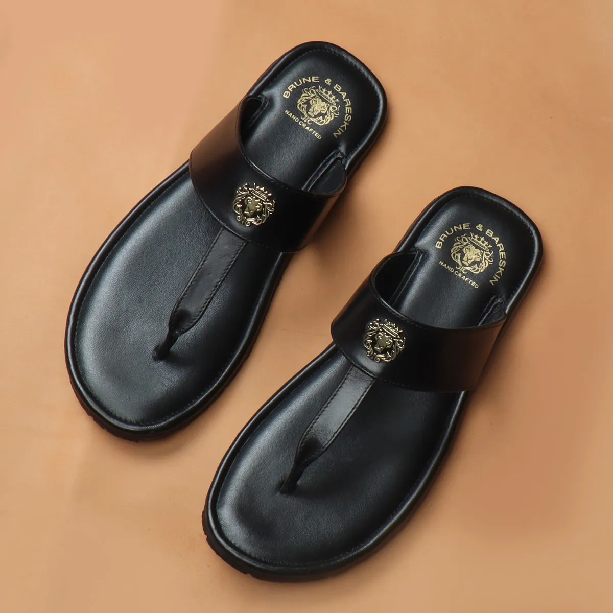 Black Leather T-Strap Slide-in Slippers with Golden Metal Lion