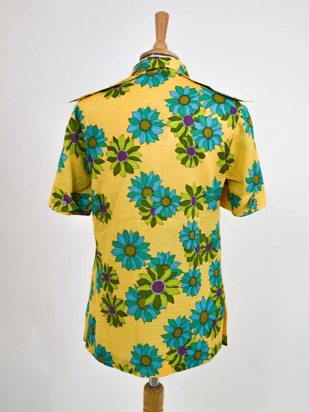 Gio Caré vintage 1970s yellow floral shirt with three buttons.