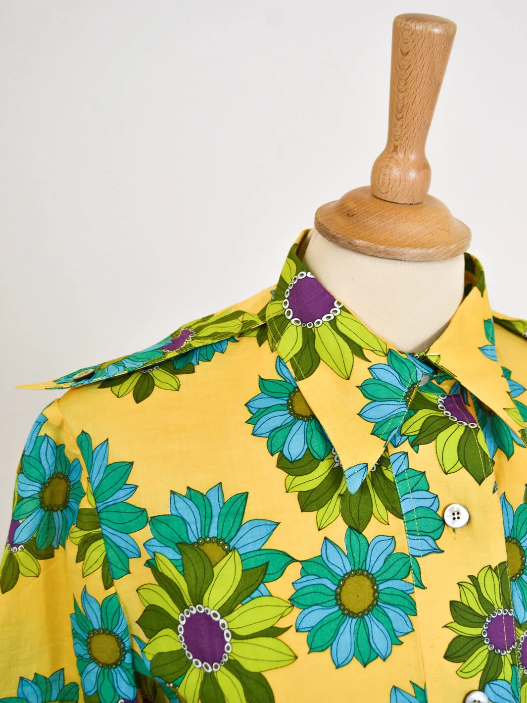 Gio Caré vintage 1970s yellow floral shirt with three buttons.