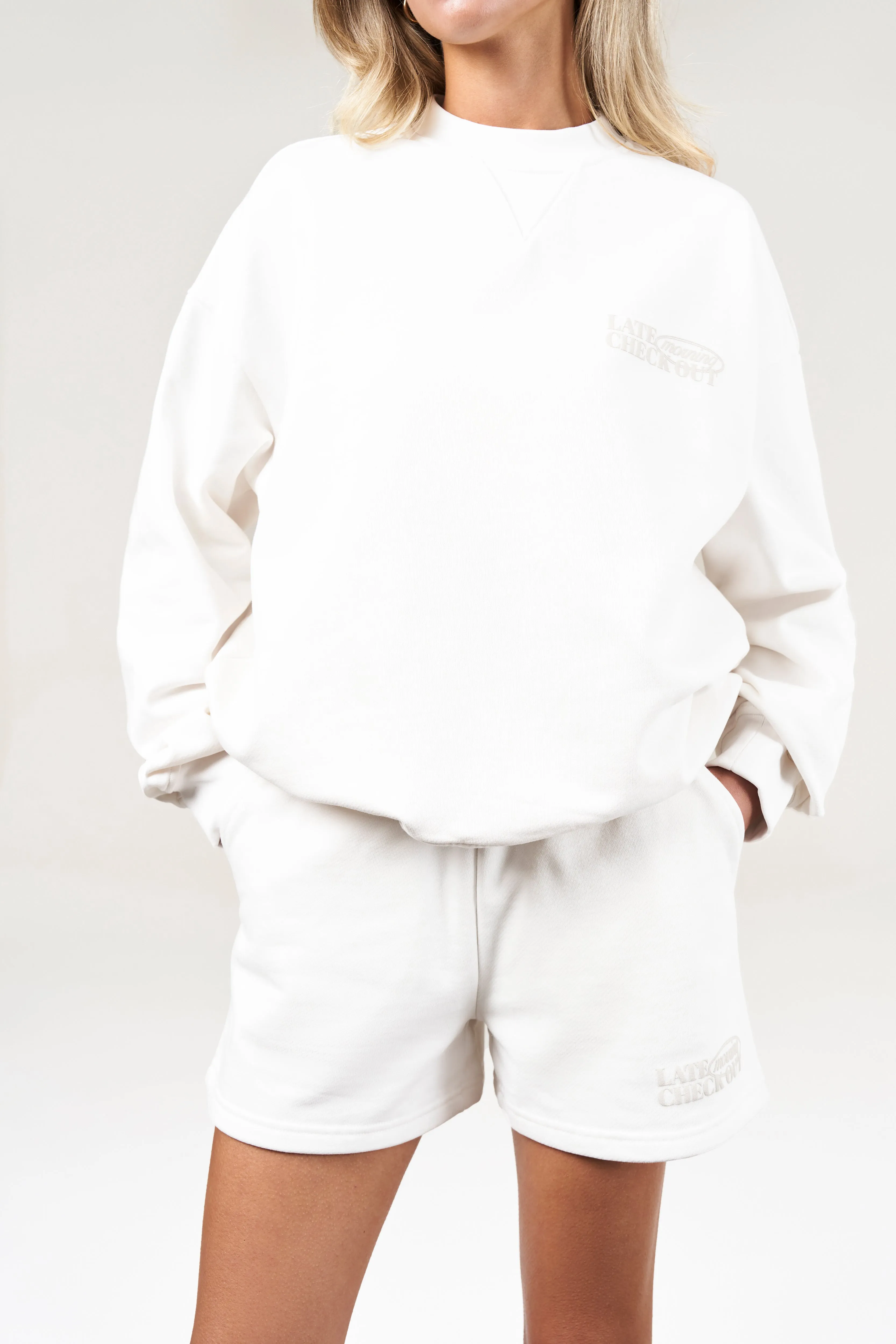 LATE CHECKOUT SWEATSHIRT - OFF WHITE