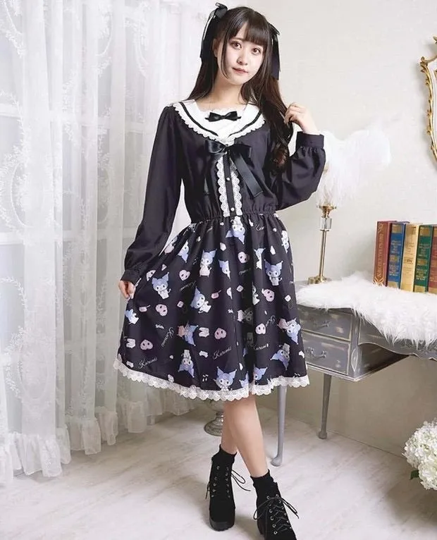 Cinnamoroll collared navy dress with rabbit ears and melody theme.