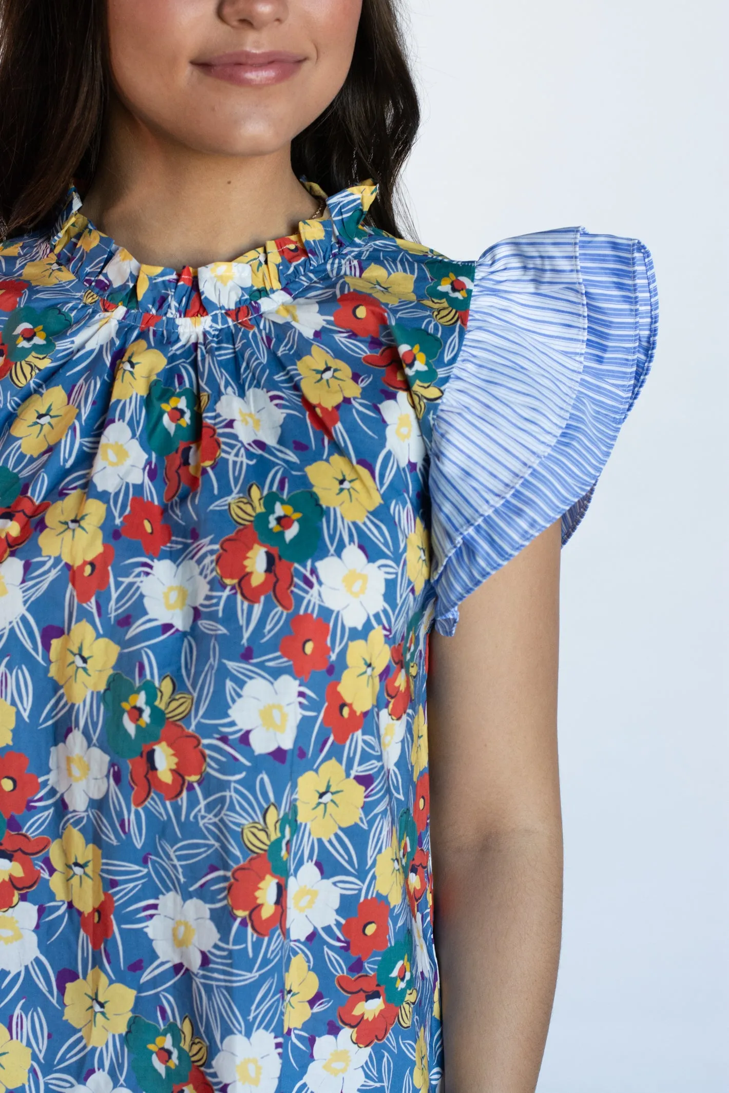 Blue Floral Top with Unexplained Print